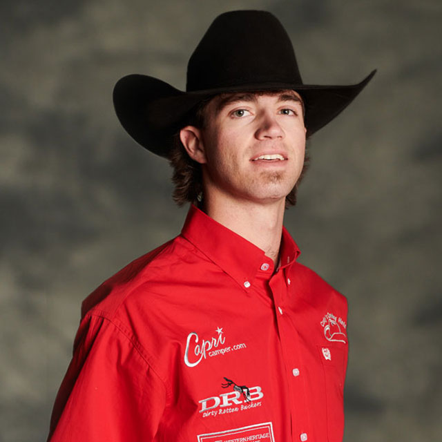 Kade Bruno wearing a red button-down shirt and a cowboy hat.